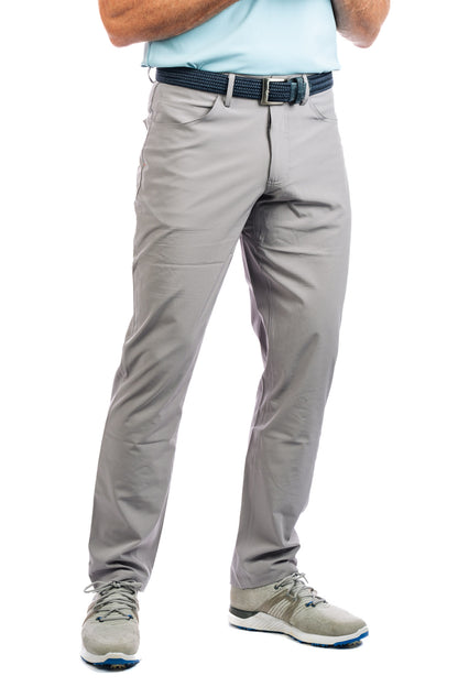 Half body shot of our Concrete golf pants on a model. 