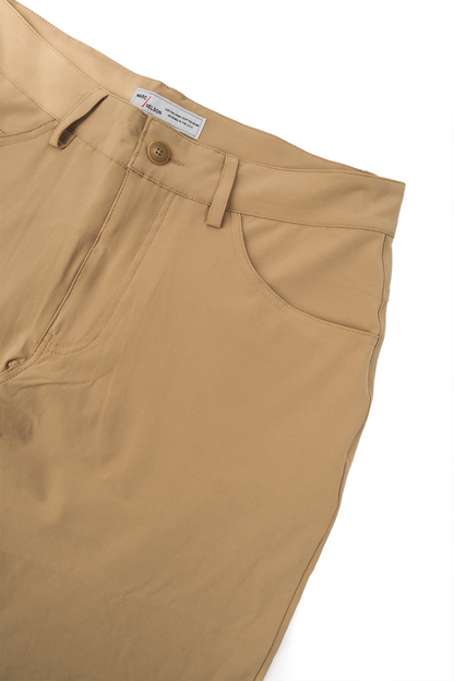 Close up photo of the front side of Sand Golf pant on a white background. 