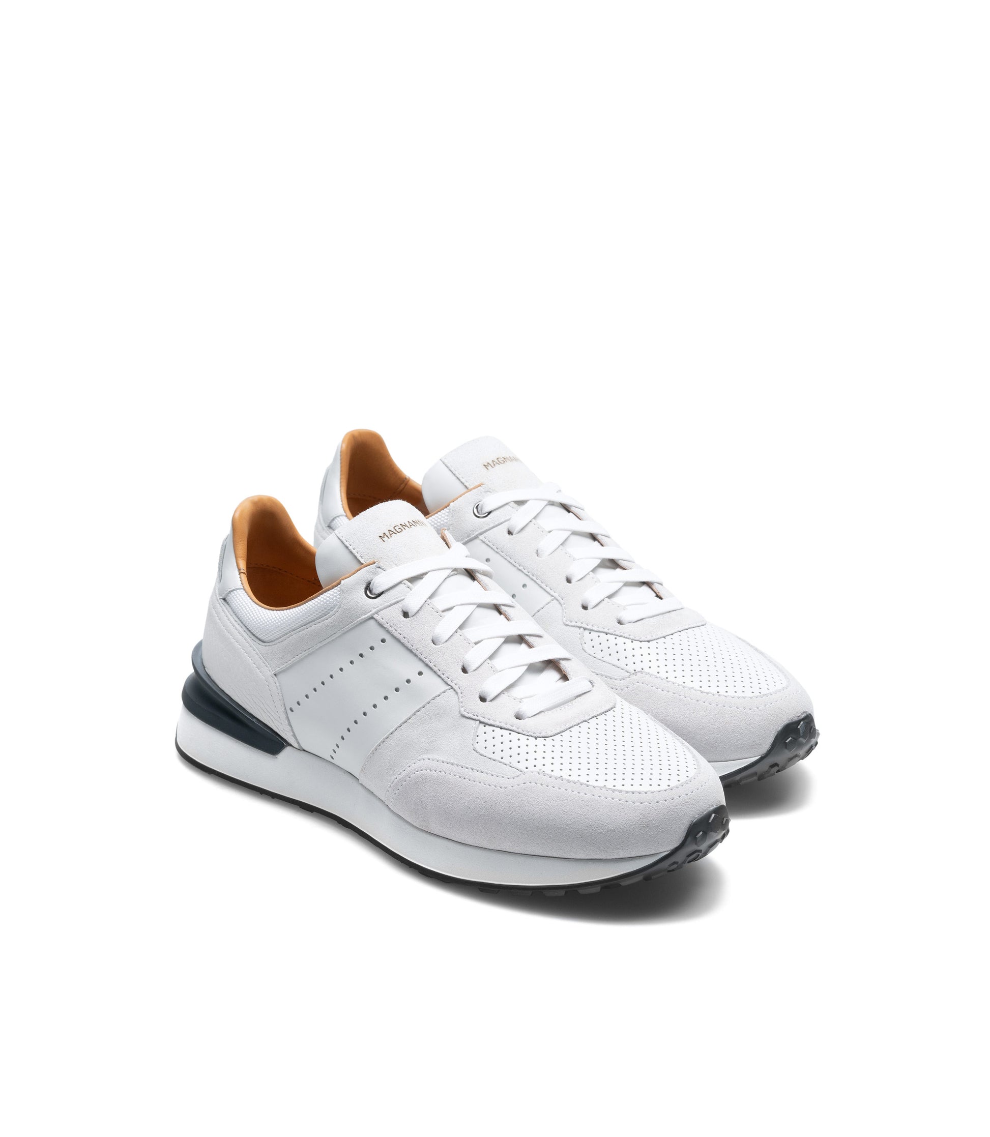 Pair of men's white leather Magnanni Sona sneakers on a white background.