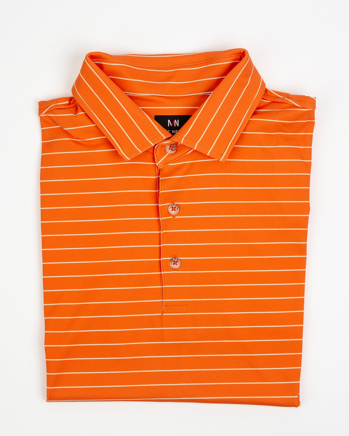 Tennessee orange and white striped men's golf polo folded on a white background.