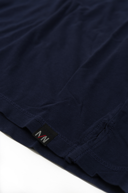 Close up shot of Navy crew neck t-shirt laid flat on a white background.