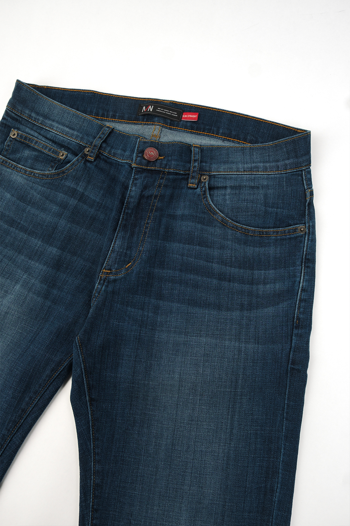 Close up photo of the Frontside of our medium wash denim from the thigh up.  