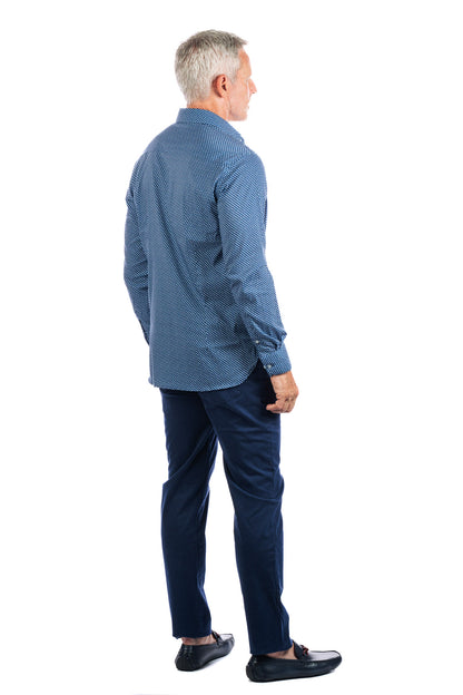 Backside profile photo of model wearing the the george navy pants on a white background and looking away from the camera.