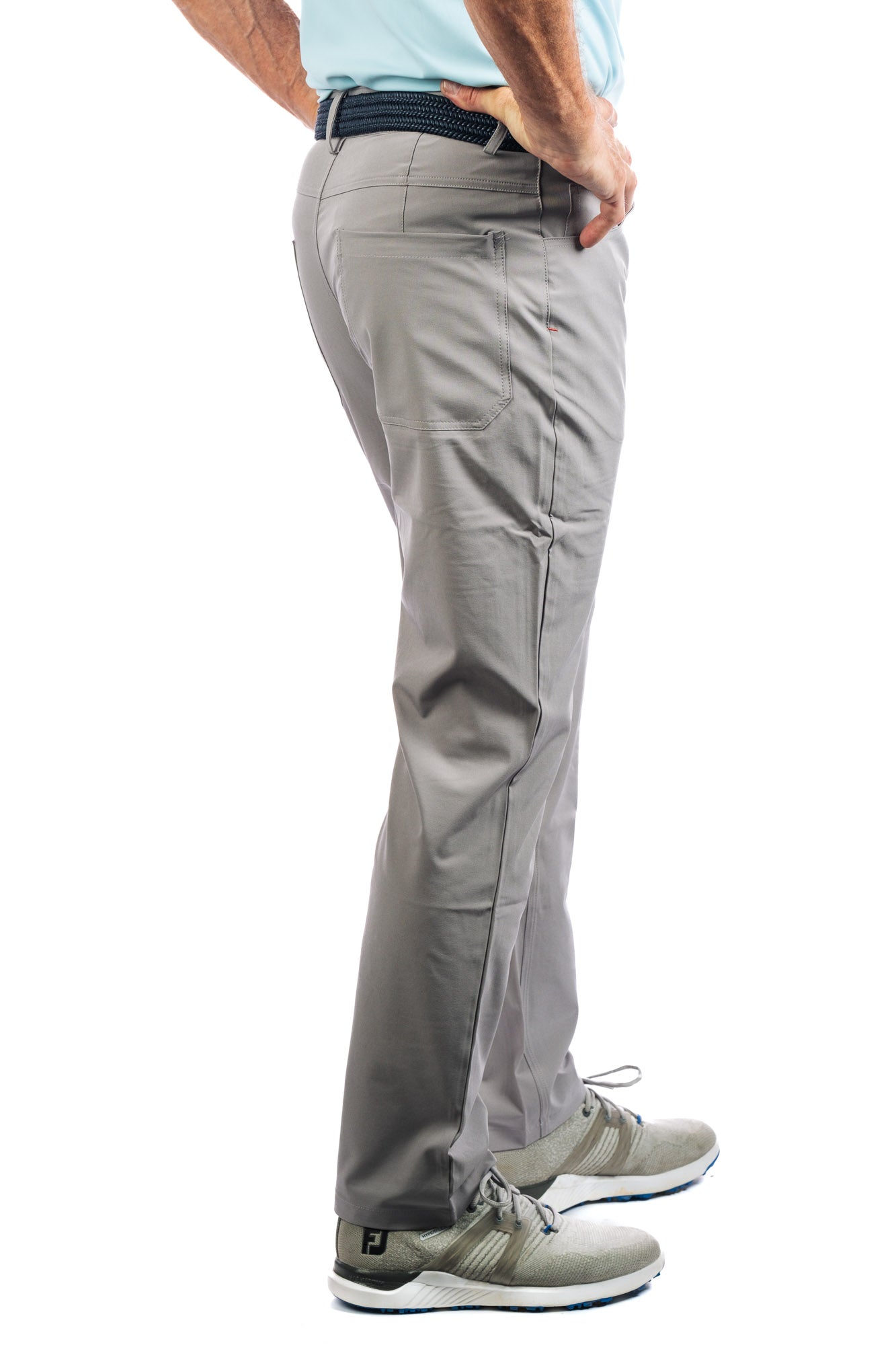 Back side view of a man wearing Marc Nelson Golf Pant in Concrete.
