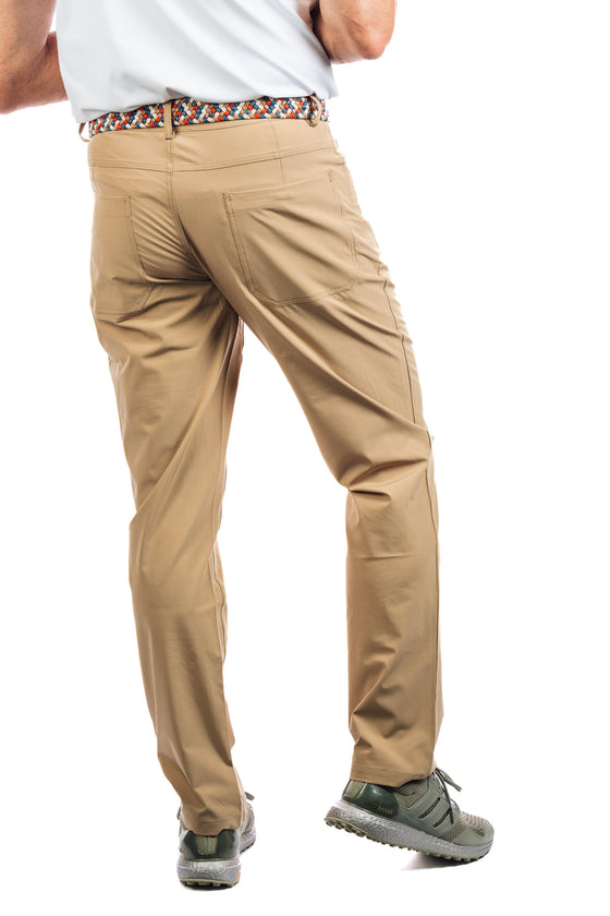 Back view of a man wearing Marc Nelson Golf Pant in Sand.