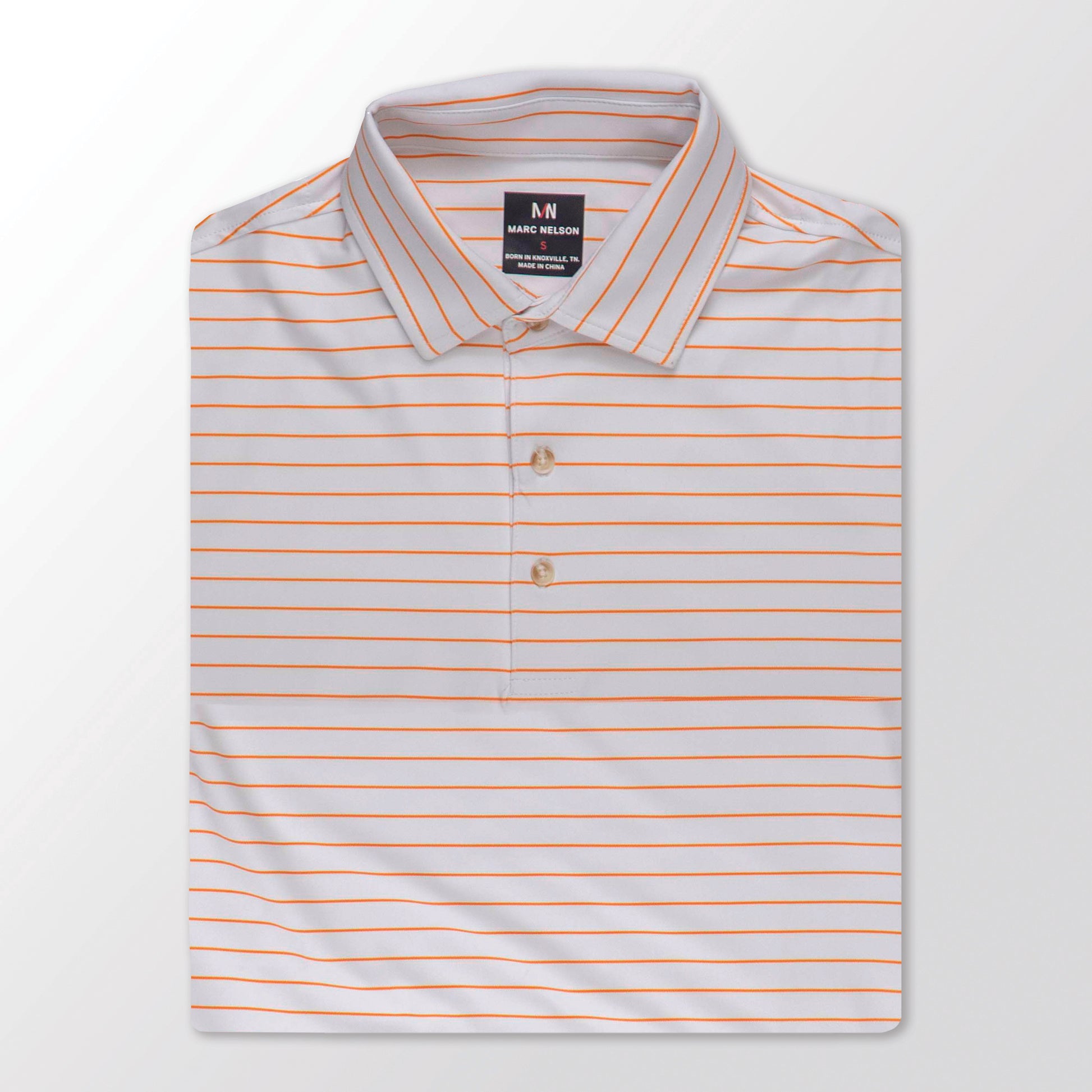 Photo of Orange Striped Golf Polo on a White background folded in a square. 