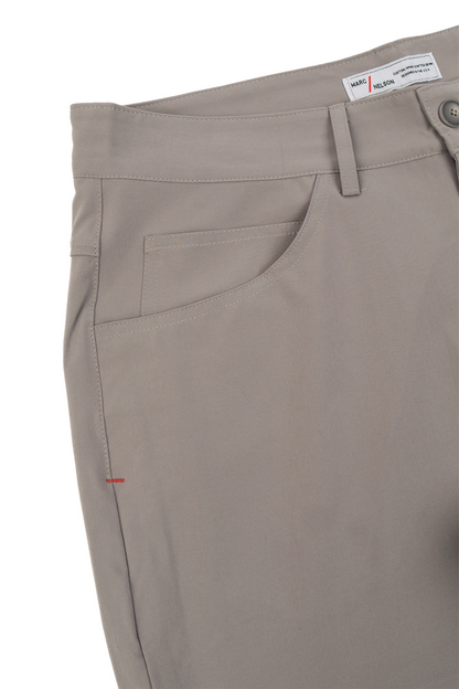 Flat photo of concrete golf pants laid on a white background. 
