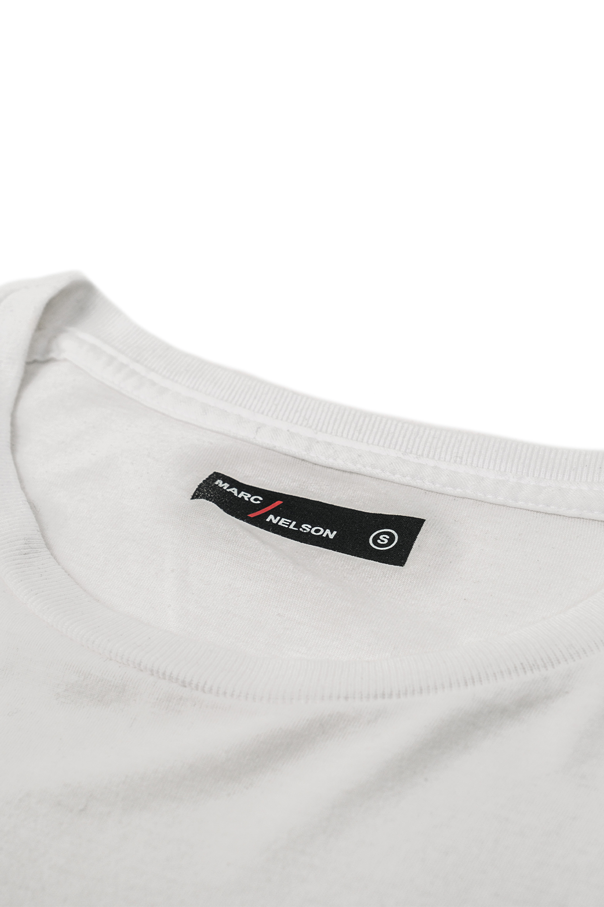 White crew neck t-shirt laid out on a white background close up shot of the tag