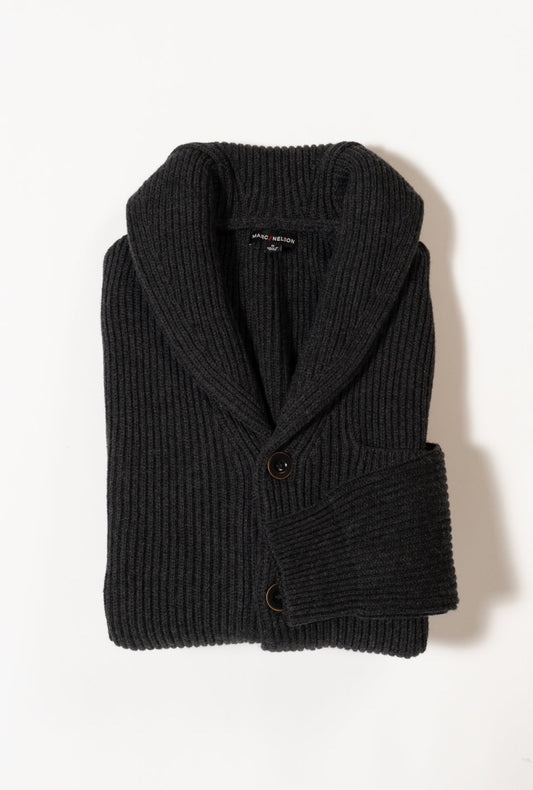 A folded dark gray ribbed knit cardigan with a shawl collar and two visible brown buttons, displayed on a white background.