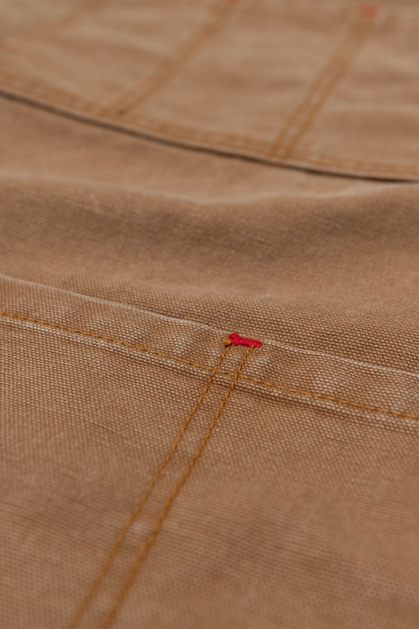 Close up photo showing the details on the Common Apron - Canvas. 